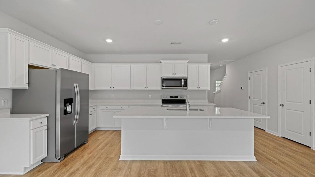Furnished interior view inside a new home in Garbon Fields, Summerville (Image 6).