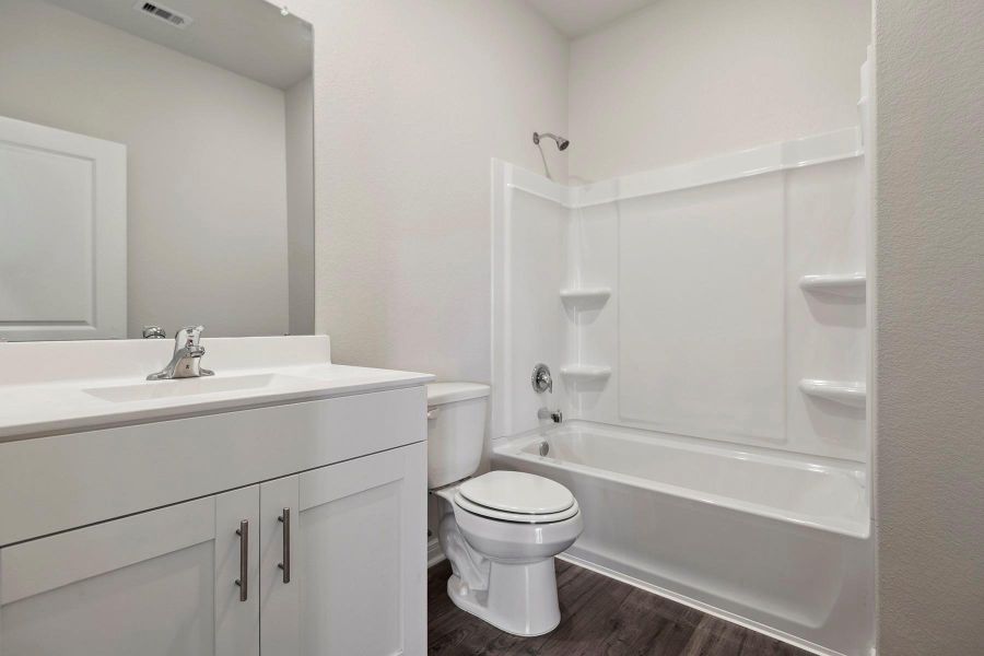 Furnished interior view inside a new home in Sweetwater Ridge, Conroe (Image 6).
