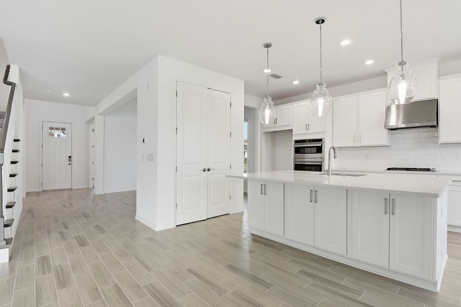 Representative furnished interior of a home built from the Barbados by Taylor Morrison in Ardisia Park, New Smyrna Beach (Image 9).