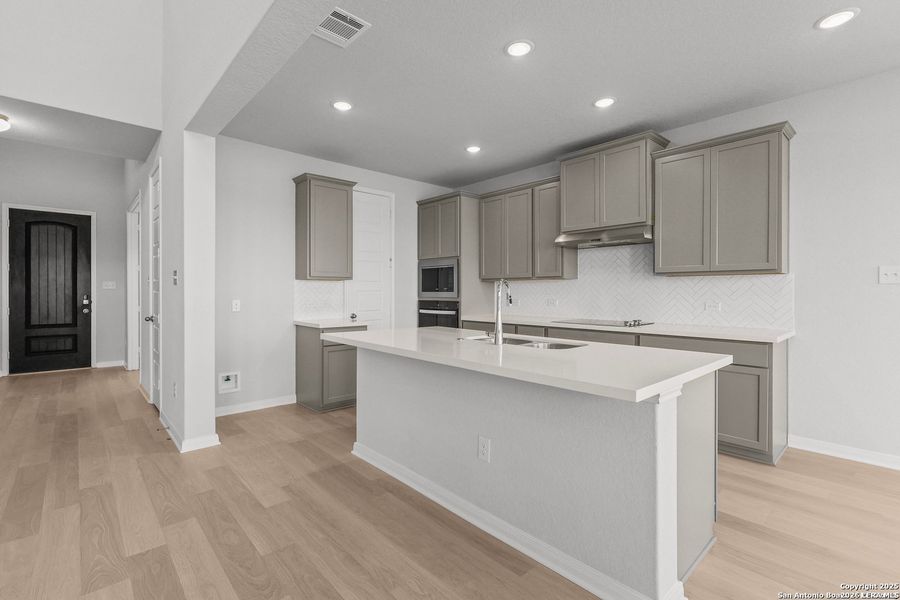 Furnished interior view inside a new home in Megan's Landing, Castroville (Image 13).