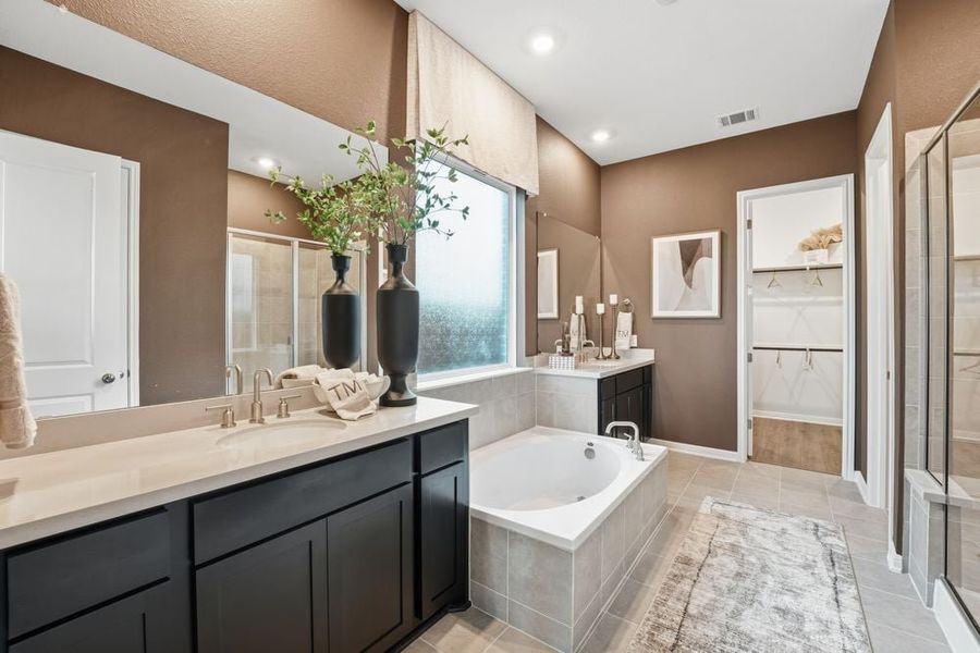 Representative furnished interior of a home built from the Burnet by Taylor Morrison in Village Grove, Dripping Springs (Image 11).