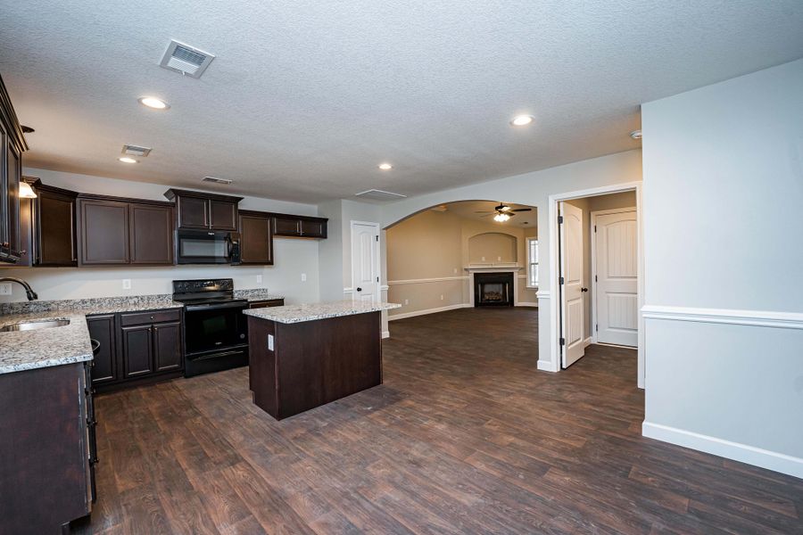 Representative furnished interior of a home built from the Saxon by Enchanted Homes in Guadalupe Heights, Seguin (Image 14).