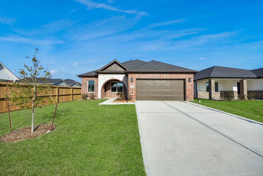 Front exterior of a new home in Hill & Dale Ranch, Splendora, TX, highlighting curb appeal (Image 22).