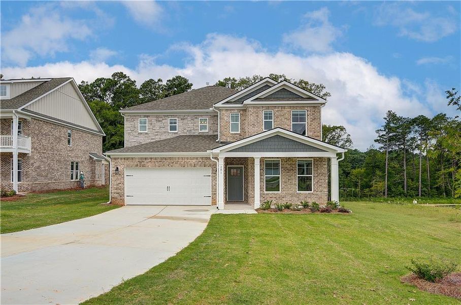 Front exterior of a new home in Burchwood, Stockbridge, GA, highlighting curb appeal (Image 22).