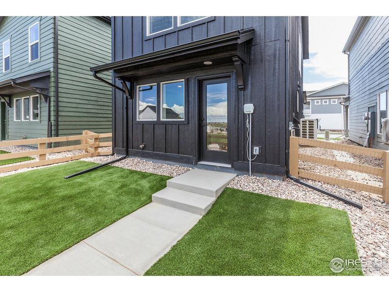 Exterior details and patio area of a home in Bloom Trailblazer Collection - Single Family Homes, Fort Collins (Image 25).