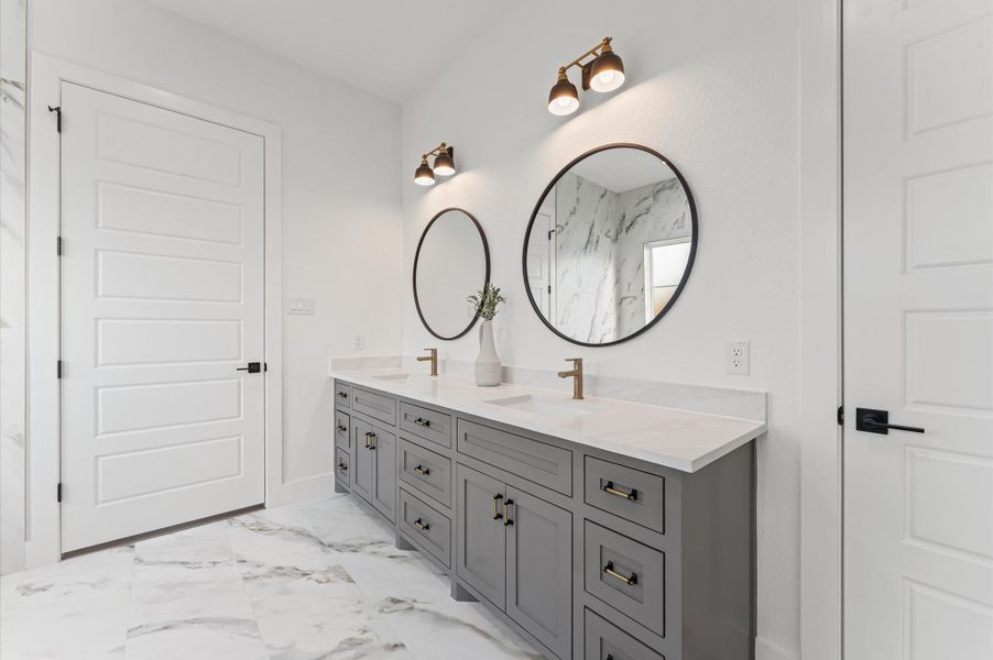 Spa-inspired bath with soaking tub, oversized walk-in shower, and double vanities.Upgraded finishes and thoughtful layout make this a luxurious everyday escape. Spa-inspired bath with soaking tub, oversized walk-in shower, and double vanities.Upgraded finishes and thoughtful layout make this a luxurious everyday escape.