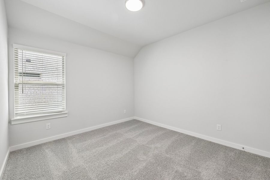 Bedroom in the Heisman home plan by Trophy Signature Homes Bedroom in the Heisman home plan by Trophy Signature Homes