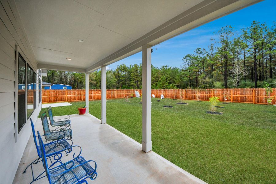Exterior details and patio area of a home in Spring Branch Crossing, Conroe (Image 2). Exterior details and patio area of a home in Spring Branch Crossing, Conroe (Image 2).