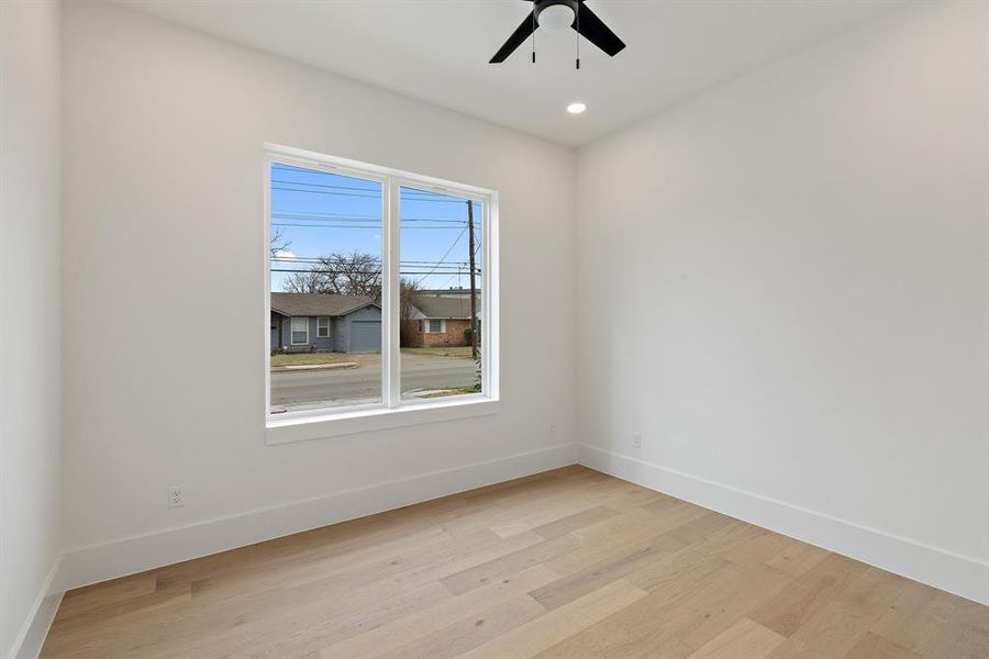 The thoughtfully designed first floor features a spacious home office or potential 5th bedroom.