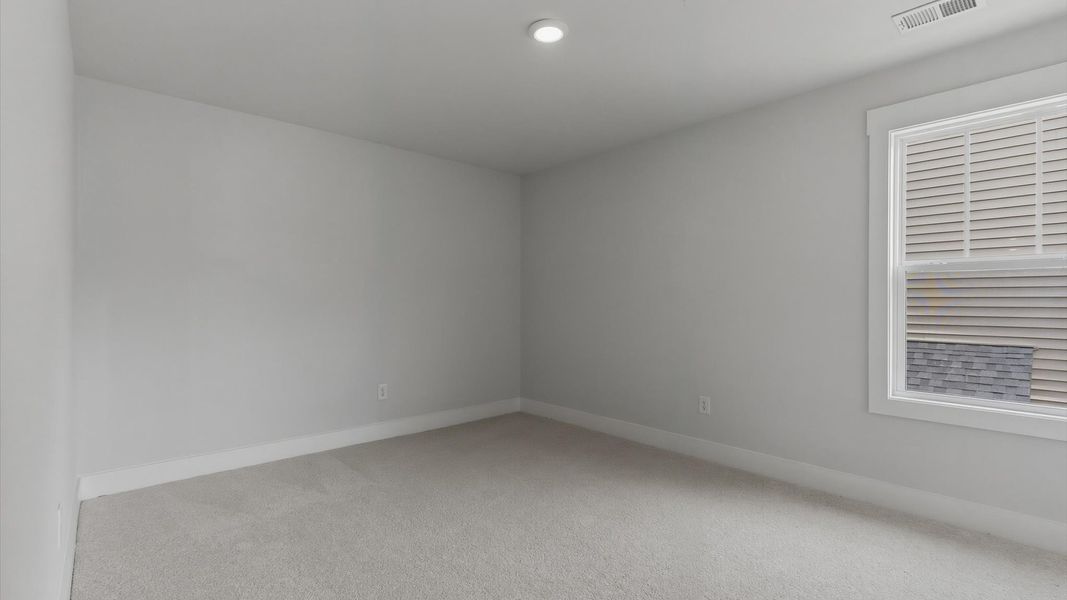 Furnished interior view inside a new home in The Reserve at Livingston Park, Easley (Image 25).
