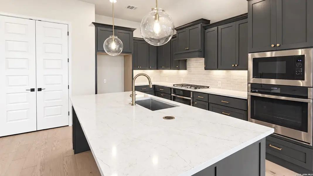 Furnished interior view inside a new home in Cibolo Valley Heights, Cibolo (Image 14).