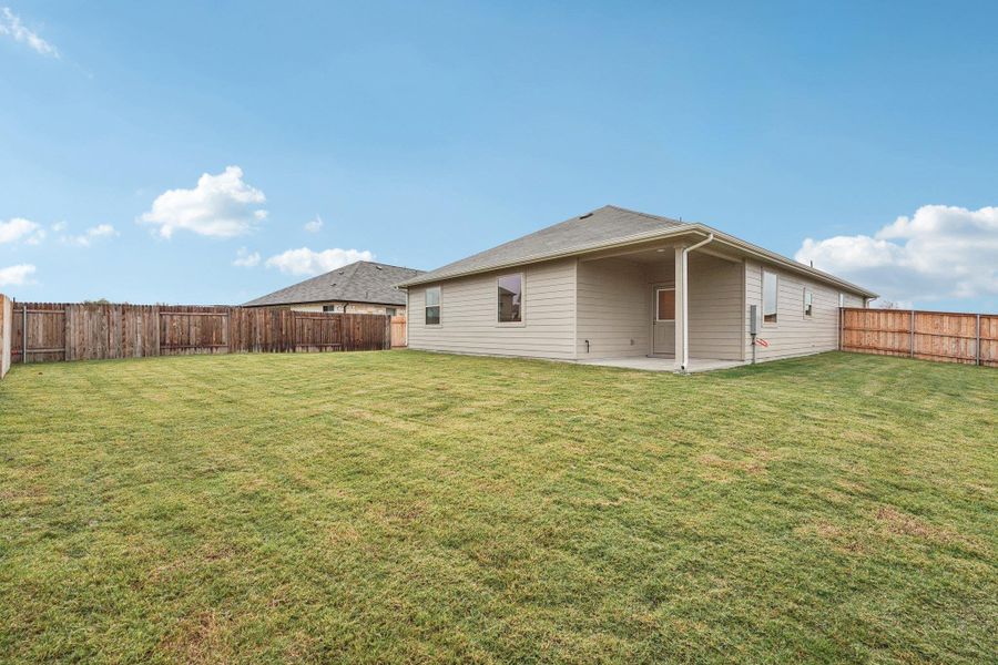 Exterior details and patio area of a home in Crosswinds, Kyle (Image 19).