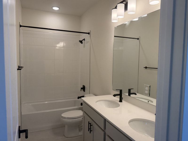 Furnished interior view inside a new home in Elevate at Wolf Ranch, Colorado Springs (Image 6).