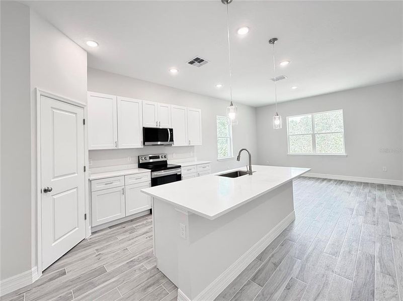 Furnished interior view inside a new home in , Eustis (Image 11). Furnished interior view inside a new home in , Eustis (Image 11).