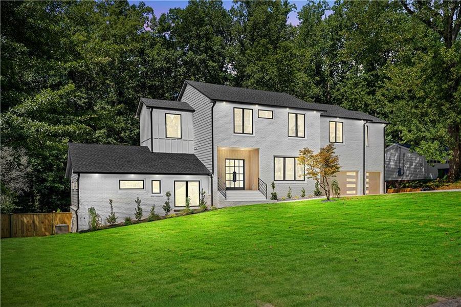 Front exterior of a new home in , Atlanta, GA, highlighting curb appeal (Image 32). Front exterior of a new home in , Atlanta, GA, highlighting curb appeal (Image 32).
