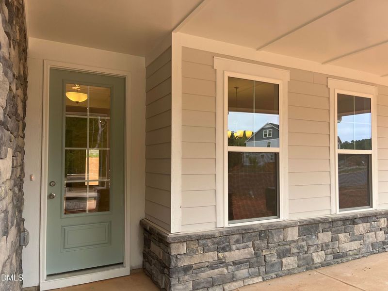 Exterior details and patio area of a home in Sage on North Main, Wake Forest (Image 3).