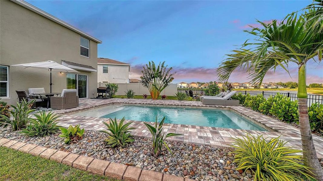 Exterior details and patio area of a home in Bella Lago, Parrish (Image 22).