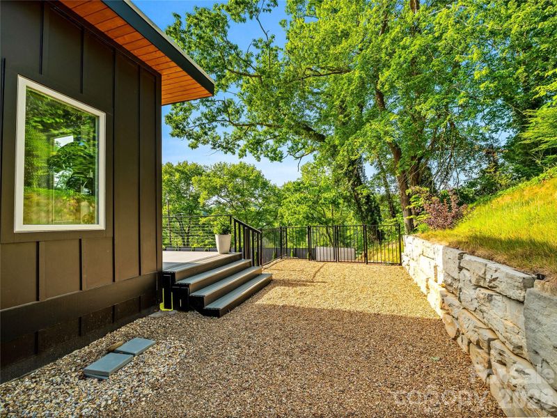 Exterior details and patio area of a home in , Asheville (Image 24).