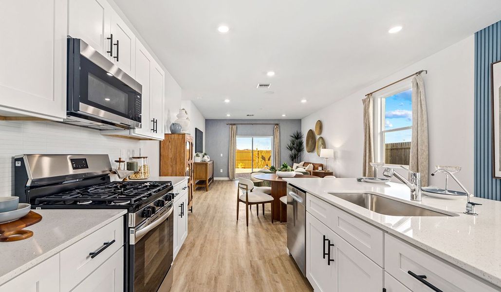 Representative furnished interior of a home built from the Carolina by D.R. Horton in Redford Estates, Tucson (Image 11).