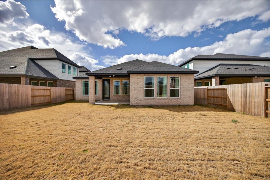 Exterior details and patio area of a home in Trillium, Richmond (Image 34). Exterior details and patio area of a home in Trillium, Richmond (Image 34).