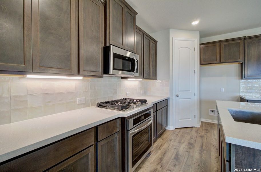 Furnished interior view inside a new home in Stream Waters, Seguin (Image 8).