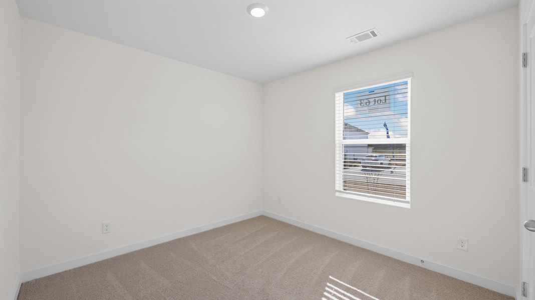 Representative unfurnished interior of a home built from the Sullivan by D.R. Horton in Evergreen Landing, Rossville (Image 10).