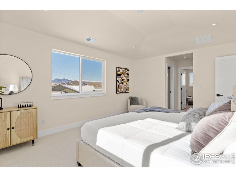 Primary Bedroom with mountain views