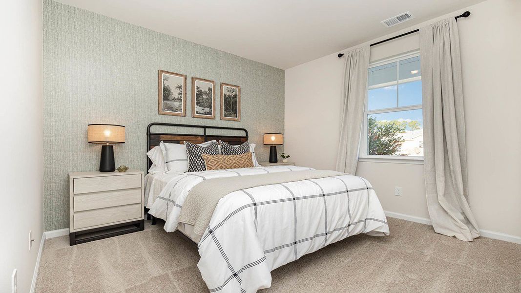 Furnished interior view inside a new home in Stanbury Creek, Supply (Image 11).