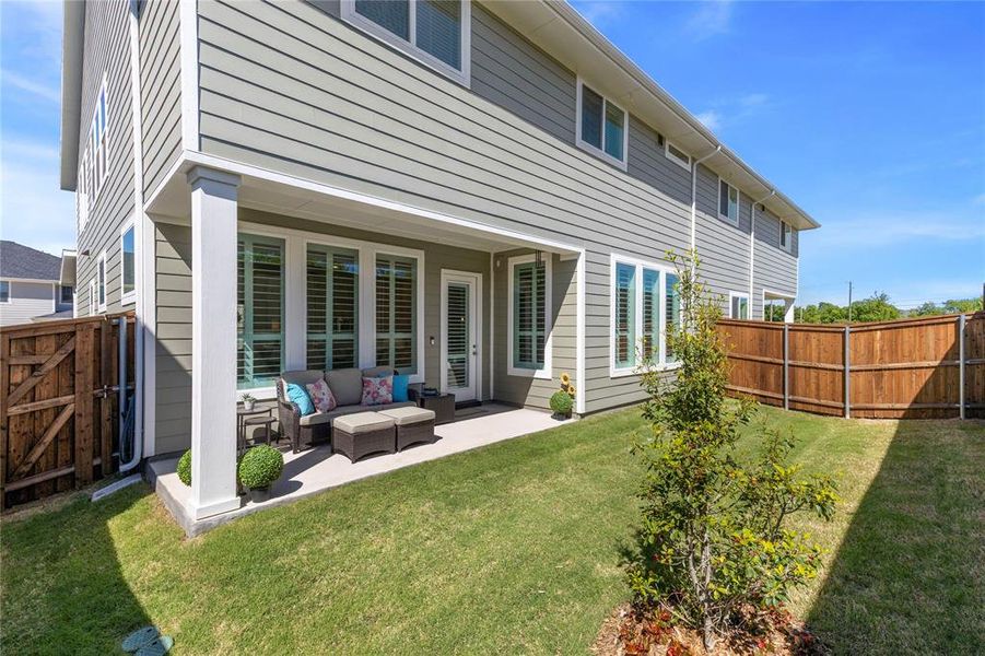 Exterior details and patio area of a home in North Square at Uptown, Celina (Image 3).