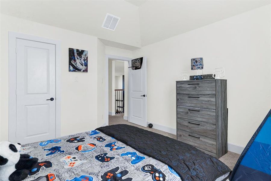 Bedroom with carpet and baseboards Bedroom with carpet and baseboards