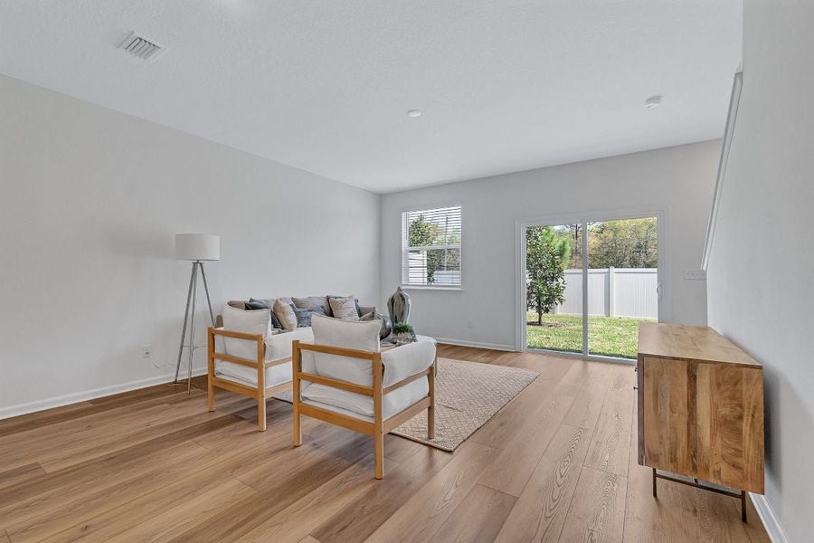 Furnished interior view inside a new home in Orchard Park Townhomes, St. Augustine (Image 6).