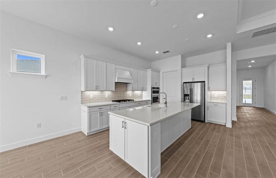 Furnished interior view inside a new home in BeachWalk by Manasota Key, Englewood (Image 16).