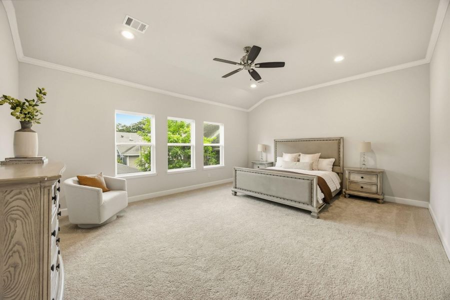 A sanctuary of light and luxury; this large, primary bedroom serves as a haven of tranquility and refined comfort. A sanctuary of light and luxury; this large, primary bedroom serves as a haven of tranquility and refined comfort.