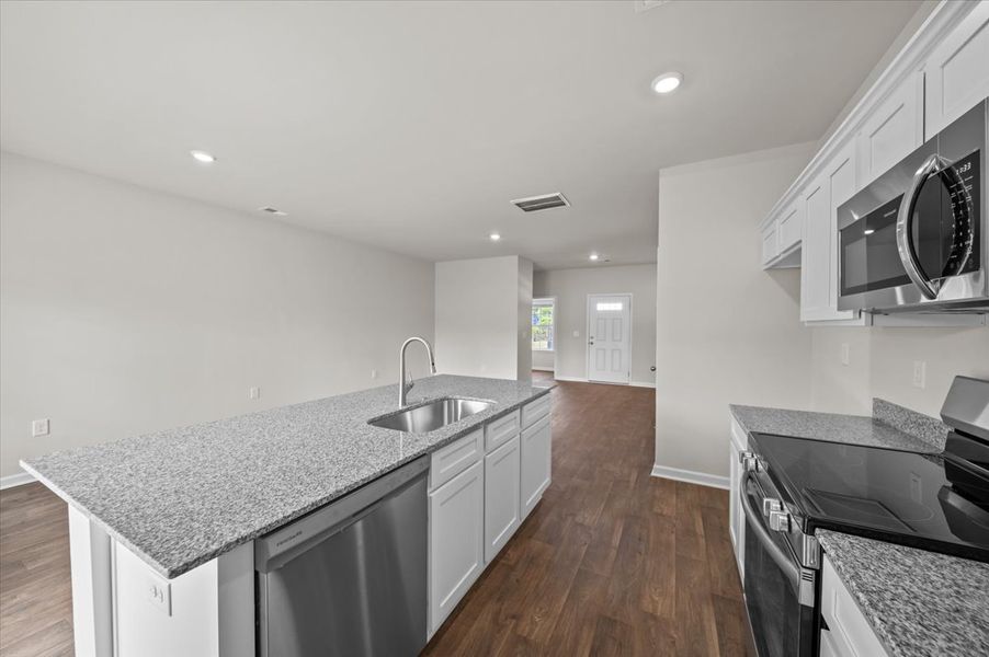 Representative furnished interior of a home built from the Palmetto II by McGuinn Homes in Clarke Townes, Anderson (Image 51).