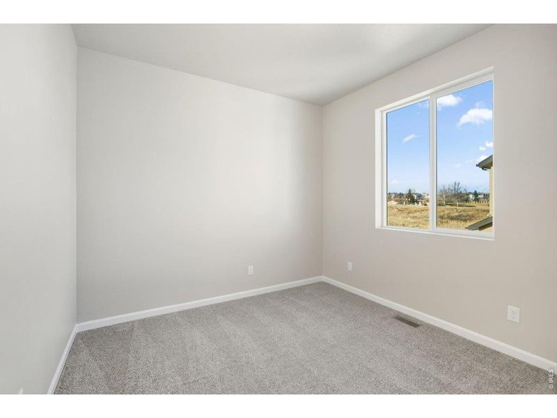 Spacious, unfurnished interior of a new home in Highlands Preserve, Mead (Image 19).