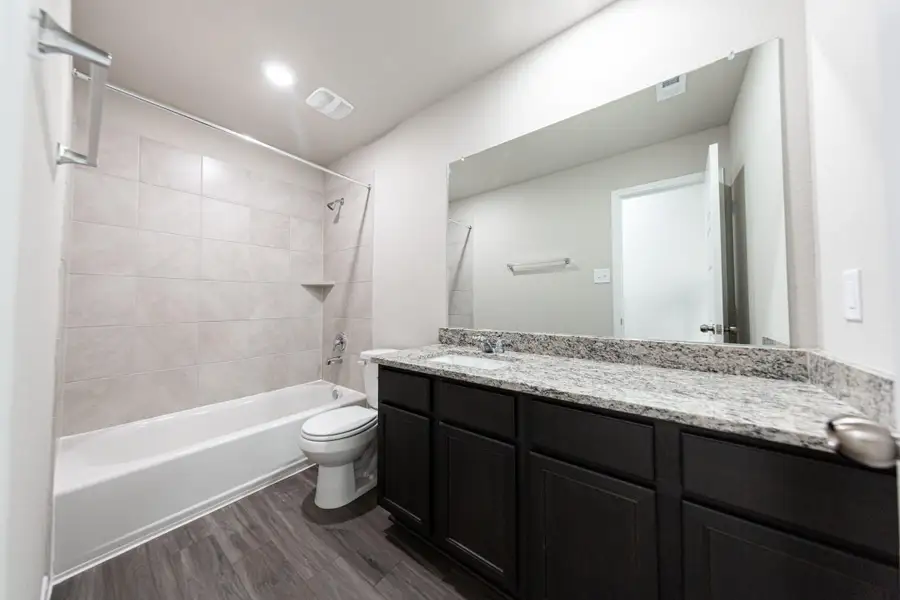 Furnished interior view inside a new home in Mackenzie Creek, Conroe (Image 8). Furnished interior view inside a new home in Mackenzie Creek, Conroe (Image 8).