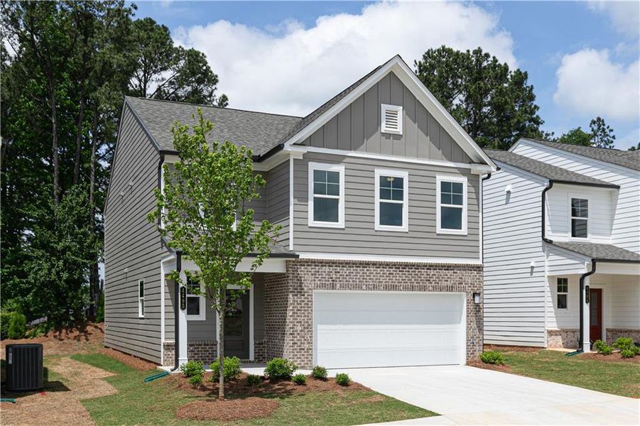 Front exterior of a new home in Kingsley, Acworth, GA, highlighting curb appeal (Image 2). Front exterior of a new home in Kingsley, Acworth, GA, highlighting curb appeal (Image 2).