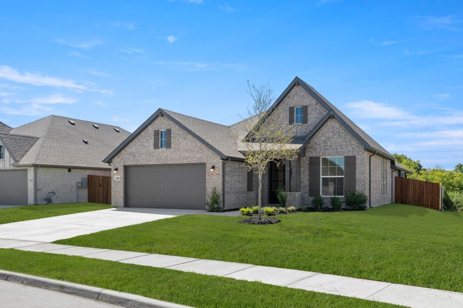 Front exterior of a new home in Hunters Ridge, Crowley, TX, highlighting curb appeal (Image 2). Front exterior of a new home in Hunters Ridge, Crowley, TX, highlighting curb appeal (Image 2).