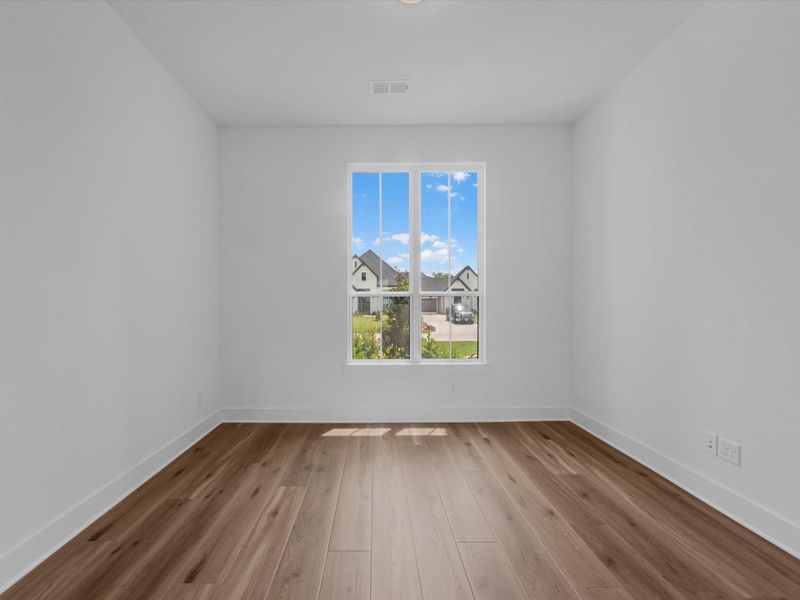 Spacious, unfurnished interior of a new home in The Estates at James Lane, Fulshear (Image 19).