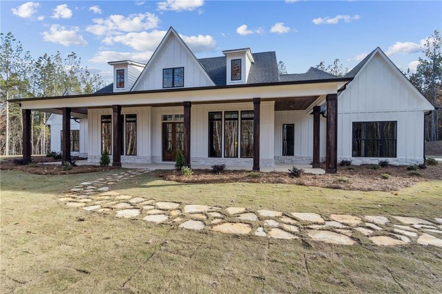 Front exterior of a new home in , Dallas, GA, highlighting curb appeal (Image 32). Front exterior of a new home in , Dallas, GA, highlighting curb appeal (Image 32).