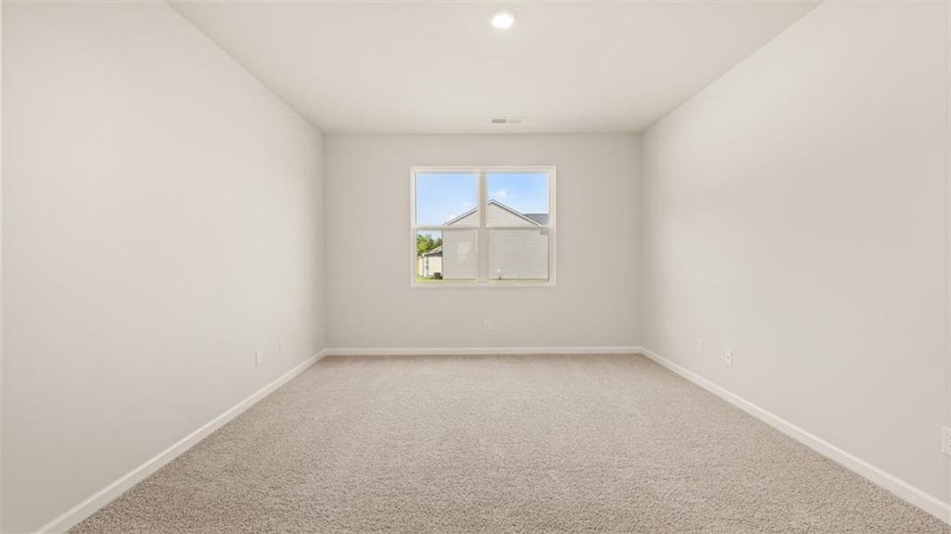 Spacious, unfurnished interior of a new home in Preserve at Dove Creek, Statham (Image 21).