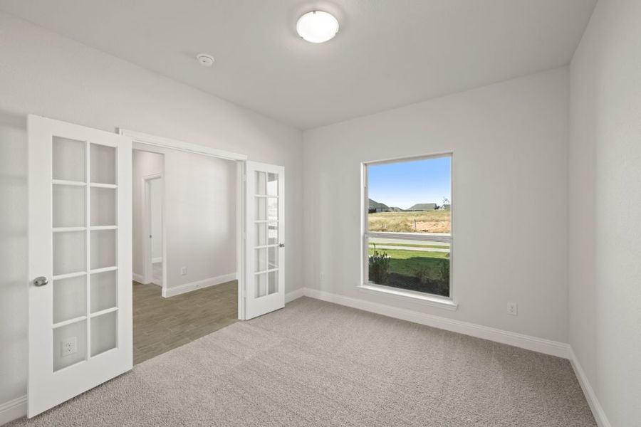 Representative exterior photo of a completed home built from the Radcliffe by Impression Homes in Timberbrook, Justin, TX (Image 11).