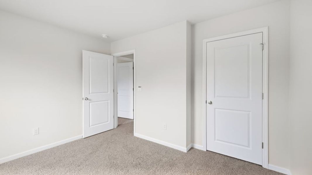 Spacious, unfurnished interior of a new home in Durbin Meadows Traditions, Fountain Inn (Image 30).