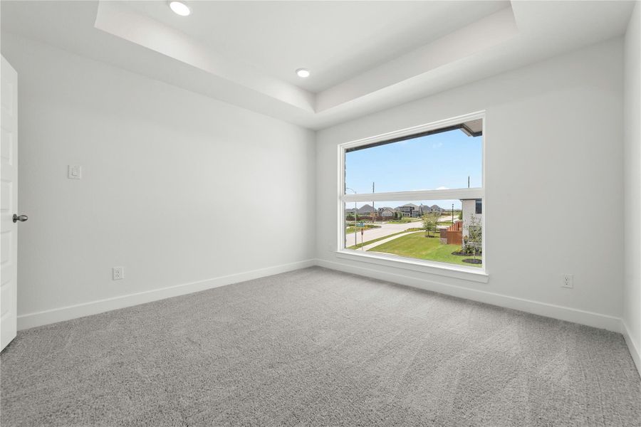 Spacious, unfurnished interior of a new home in Sunterra, Katy (Image 12).