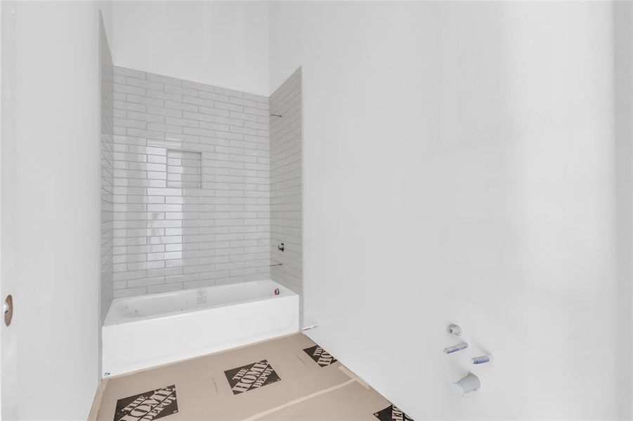 Bathroom featuring shower / tub combination Bathroom featuring shower / tub combination