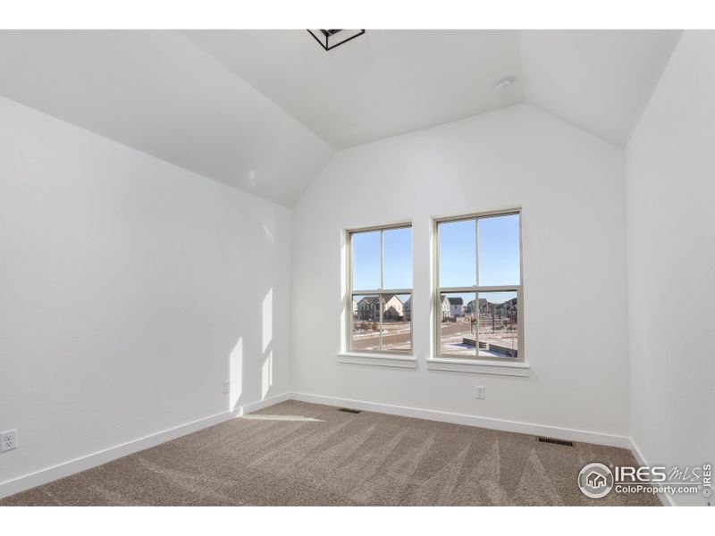 Secondary Bedroom with Vaulted Ceiling Secondary Bedroom with Vaulted Ceiling