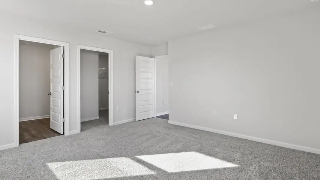Spacious, unfurnished interior of a new home in Magnolia at the Bluffs Phase 3, Freeport (Image 19).