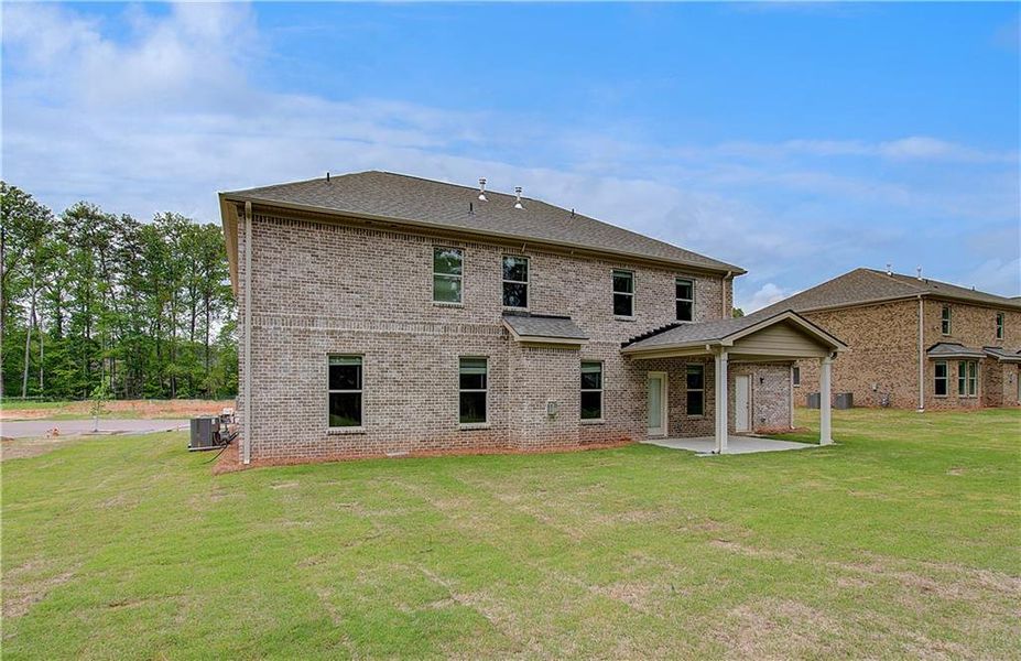 Exterior details and patio area of a home in Cambria at Traditions, Hampton (Image 20).