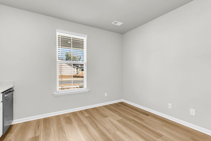 Spacious, unfurnished interior of a new home in Limehouse Village: Arbor Series, Summerville (Image 21).