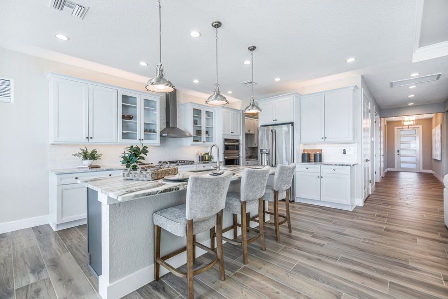 Representative furnished interior of a home built from the Charlotte II by William Ryan Homes in River Preserve Estates, Parrish (Image 13).